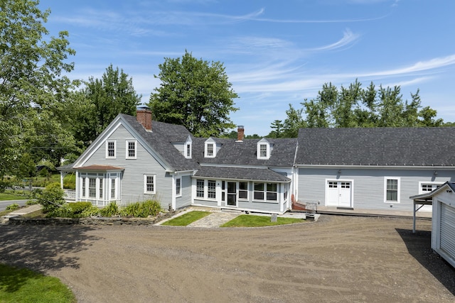 95 Washington Rd, Jefferson, ME 04348 - back of property with a chimney and a shingled roof