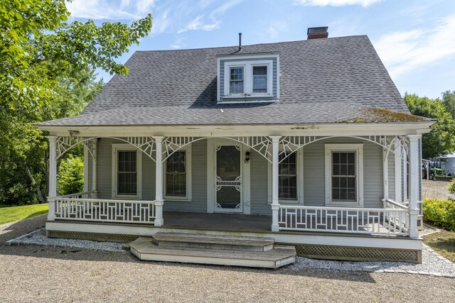 view of front of property featuring covered porch