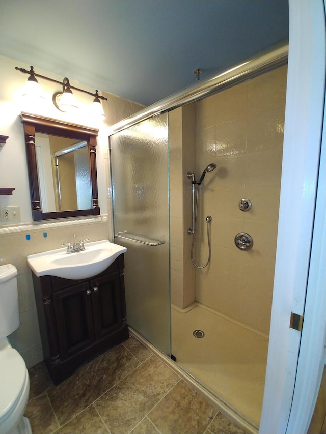 95 Washington Rd, Jefferson, ME 04348 - full bathroom with vanity, toilet, and a stall shower