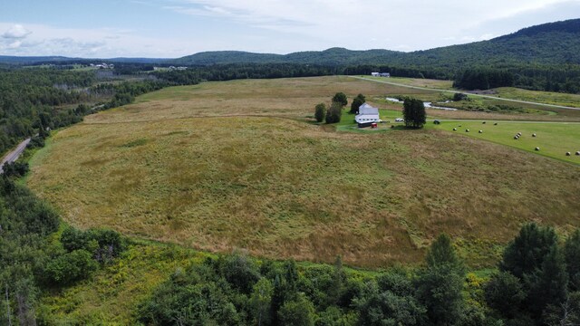 bird's eye view with a mountain view and a rural view