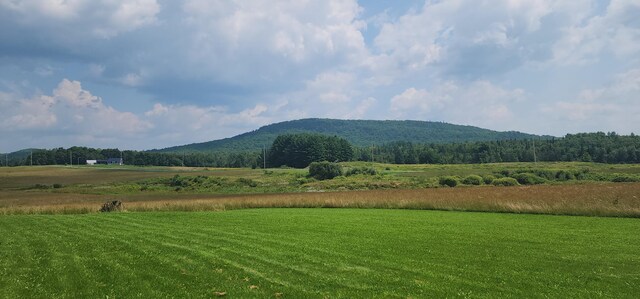 view of mountain feature featuring a rural view