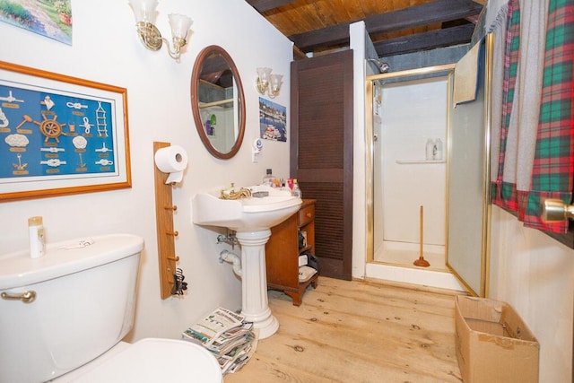 bathroom with a shower, wood-type flooring, wood ceiling, and toilet