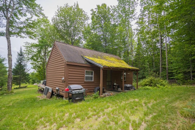 exterior space with a lawn