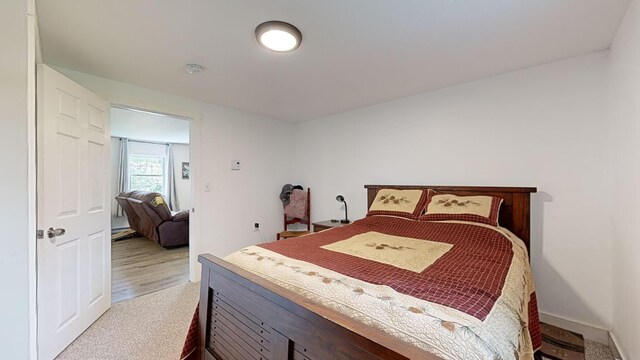 bedroom featuring light wood-type flooring