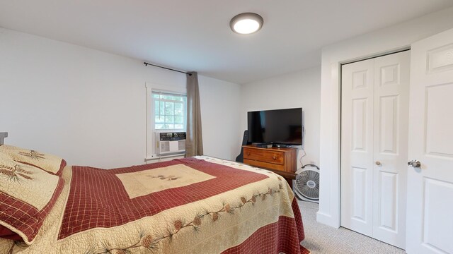 carpeted bedroom with cooling unit