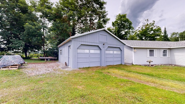 garage with a lawn