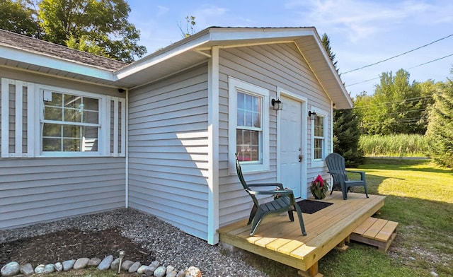 view of side of home with a lawn