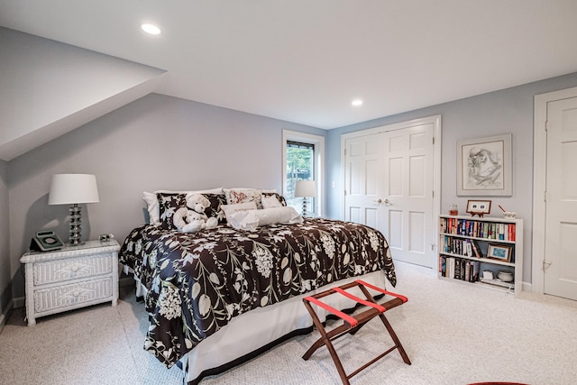 carpeted bedroom with a closet