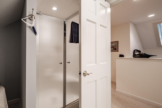 bathroom with lofted ceiling