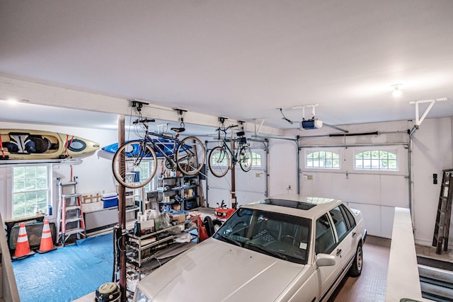 garage featuring a garage door opener