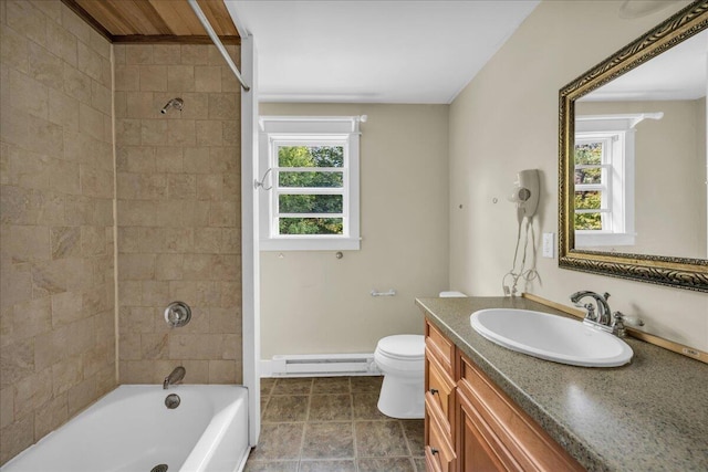 full bathroom featuring a healthy amount of sunlight, baseboard heating, vanity, and toilet