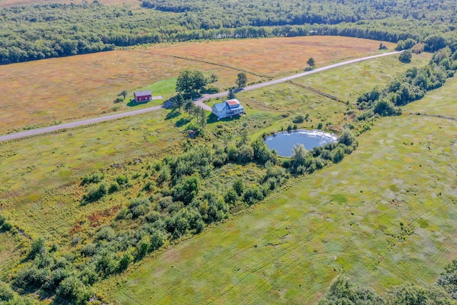 bird's eye view with a water view and a rural view