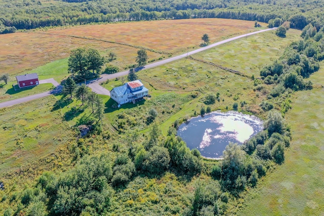 aerial view with a water view and a rural view