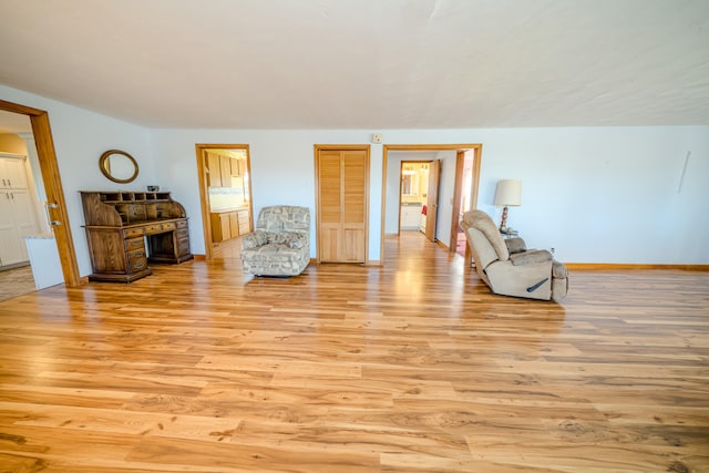 sitting room featuring light hardwood / wood-style floors