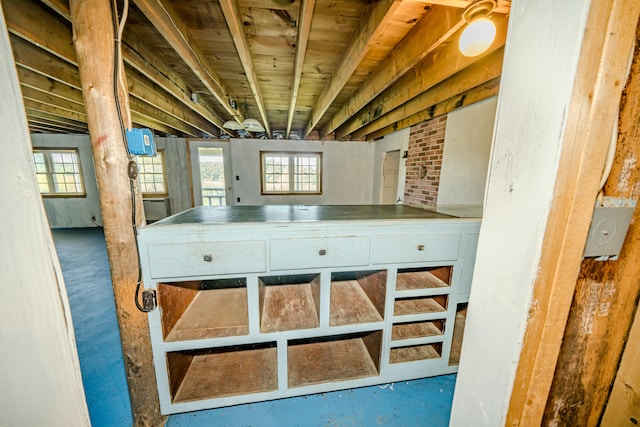 interior space with a healthy amount of sunlight and concrete flooring