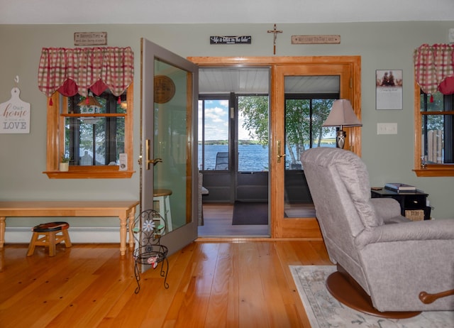 803 Lake Shore Rd, Madawaska, ME 04773 - entrance foyer with french doors and hardwood / wood-style flooring