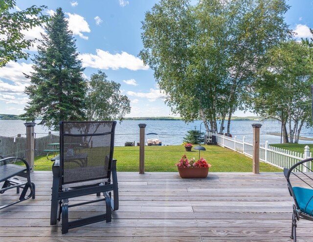 803 Lake Shore Rd, Madawaska, ME 04773 - wooden terrace featuring a water view, fence, and a yard