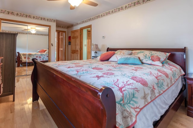 803 Lake Shore Rd, Madawaska, ME 04773 - bedroom with a ceiling fan, light wood-style flooring, and a closet