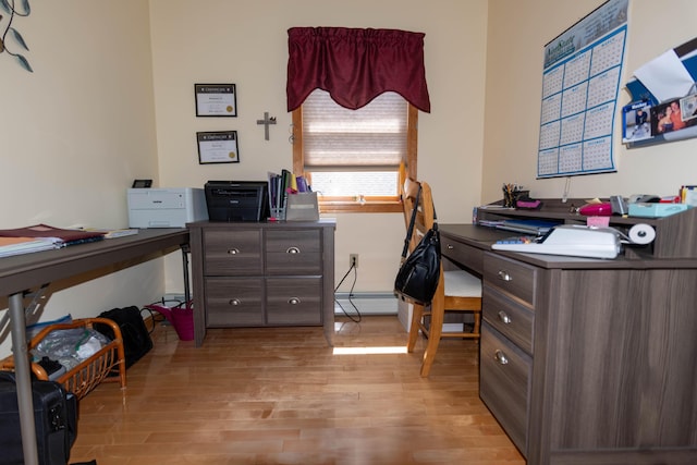 803 Lake Shore Rd, Madawaska, ME 04773 - office area with a baseboard heating unit and light wood finished floors