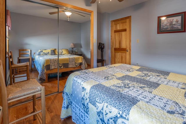 803 Lake Shore Rd, Madawaska, ME 04773 - bedroom featuring a closet, wood finished floors, and a ceiling fan