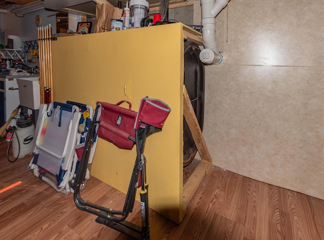 803 Lake Shore Rd, Madawaska, ME 04773 - below grade area featuring wood finished floors