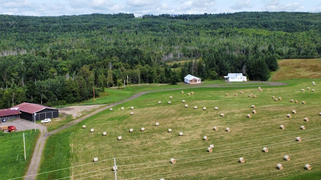 birds eye view of property featuring a rural view