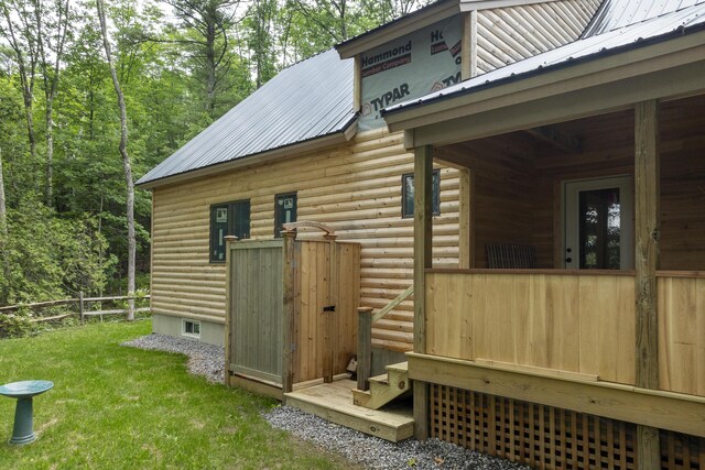 view of home's exterior with a yard