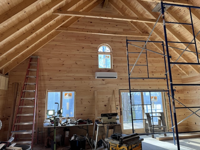 unfurnished living room with high vaulted ceiling and wooden walls