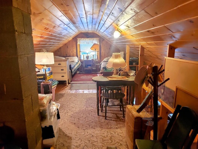 bedroom featuring vaulted ceiling and wood ceiling