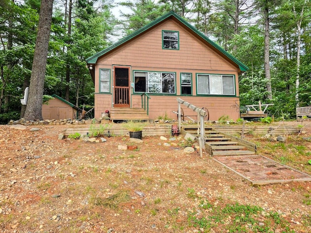 view of front facade featuring an outbuilding