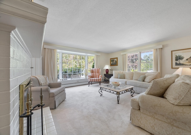 carpeted living room featuring a textured ceiling and a wealth of natural light