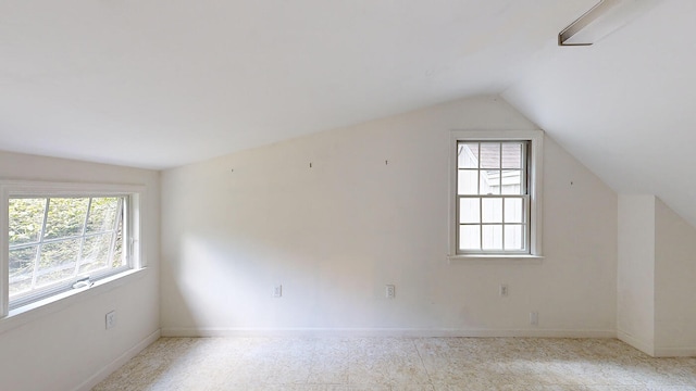 bonus room with vaulted ceiling