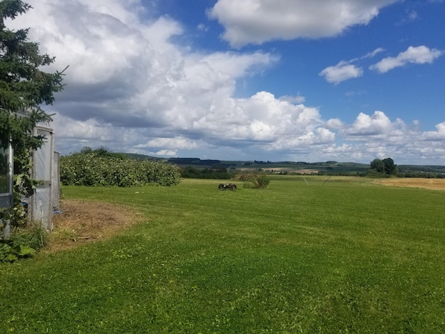 381 Caribou Rd, Presque Isle, ME 04769 - view of green lawn featuring a view of countryside