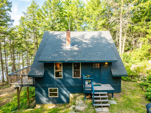 view of front of property with a wooden deck