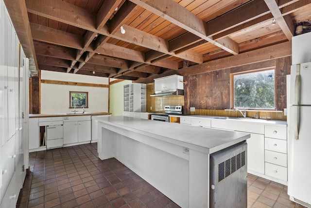4 Wilson St, Topsham, ME 04086 - kitchen featuring stainless steel electric stove, freestanding refrigerator, a wooden ceiling with exposed beams, white cabinets, and a kitchen island