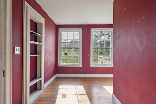 4 Wilson St, Topsham, ME 04086 - unfurnished room with hardwood / wood-style floors and plenty of natural light