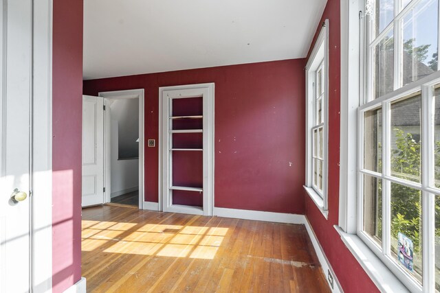 4 Wilson St, Topsham, ME 04086 - empty room with hardwood / wood-style floors and baseboards