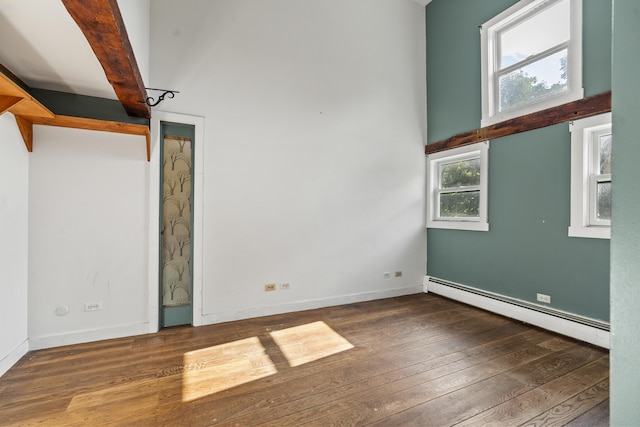 4 Wilson St, Topsham, ME 04086 - spare room featuring a baseboard radiator and hardwood / wood-style flooring