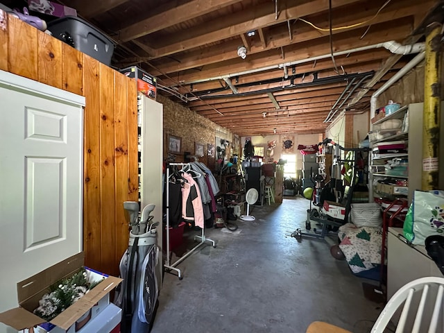 interior space featuring wooden walls