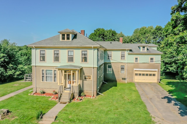 443 S Union Rd, Union, ME 04862 - view of front facade with an attached garage, driveway, a chimney, and a front yard