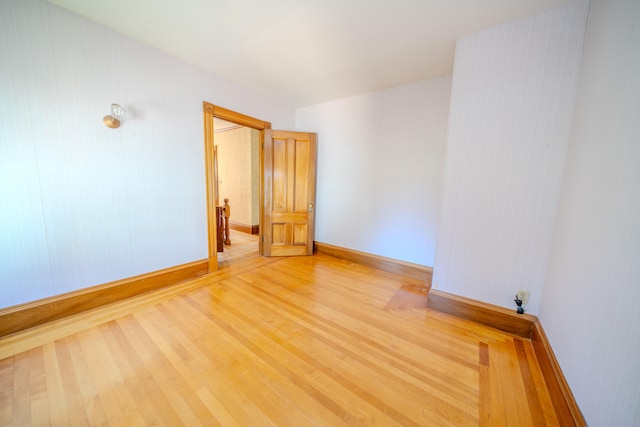 unfurnished room featuring light wood-type flooring