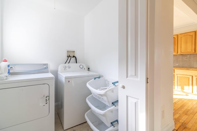 laundry room with laundry area and separate washer and dryer
