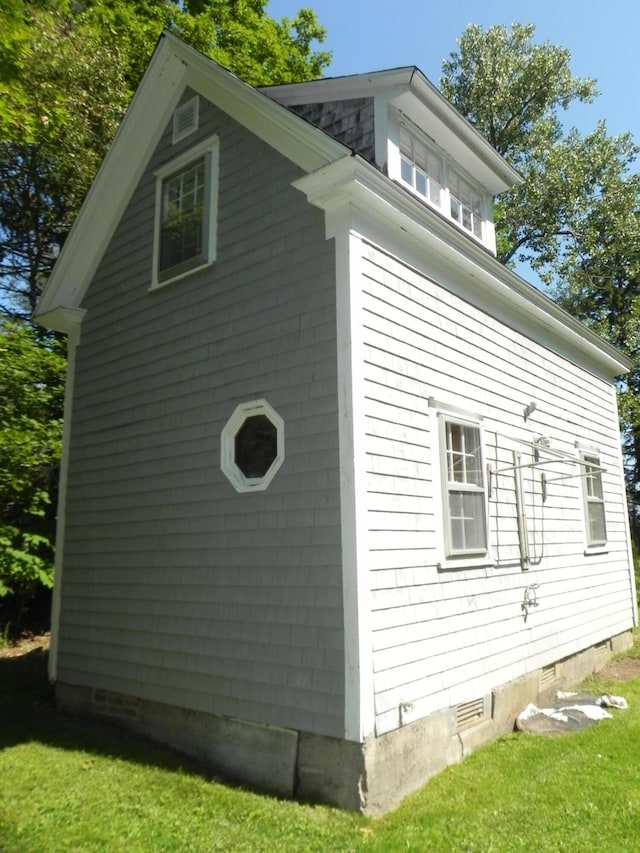 6 Sardine Way, Lubec, ME 04652 - view of property exterior featuring crawl space and a lawn