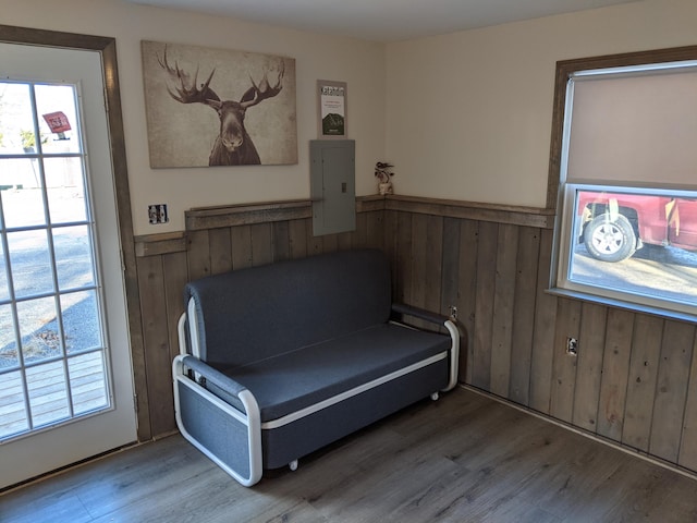 living area featuring hardwood / wood-style floors and electric panel