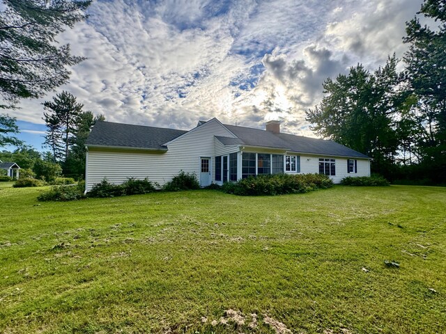 12 Hycrest Ln, Old Town, ME 04468 - view of side of home with a chimney and a lawn