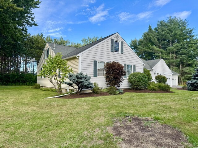12 Hycrest Ln, Old Town, ME 04468 - view of home's exterior with roof with shingles, a garage, and a yard