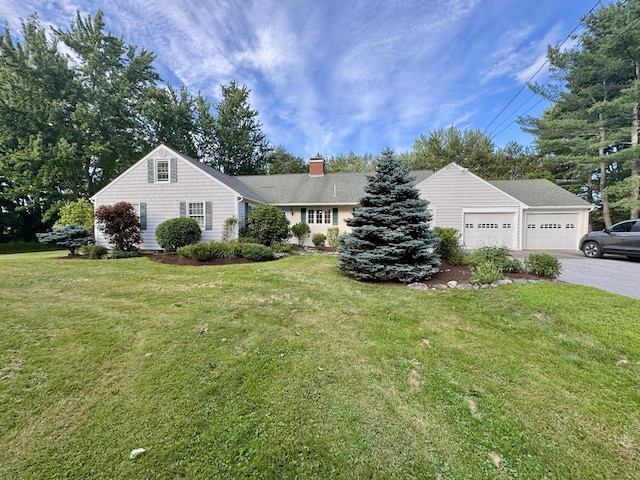 12 Hycrest Ln, Old Town, ME 04468 - view of front of house with a front yard, aphalt driveway, an attached garage, and a chimney