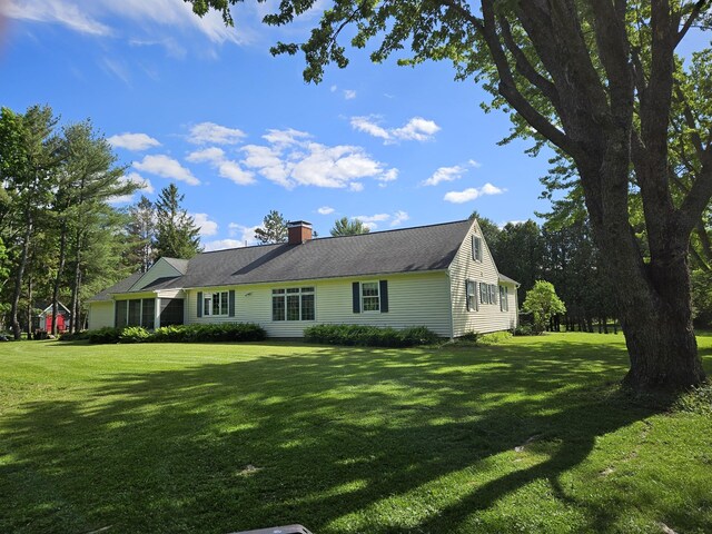 12 Hycrest Ln, Old Town, ME 04468 - view of front of home with a chimney and a front yard