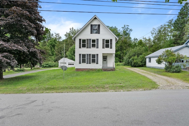 view of front of property featuring a front lawn