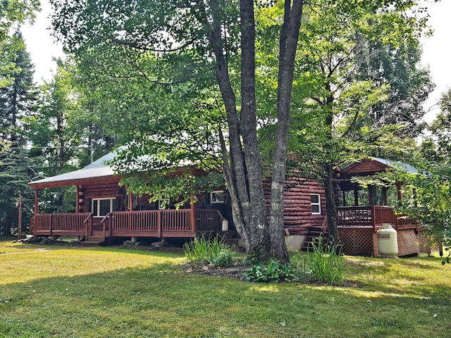 view of yard with a wooden deck